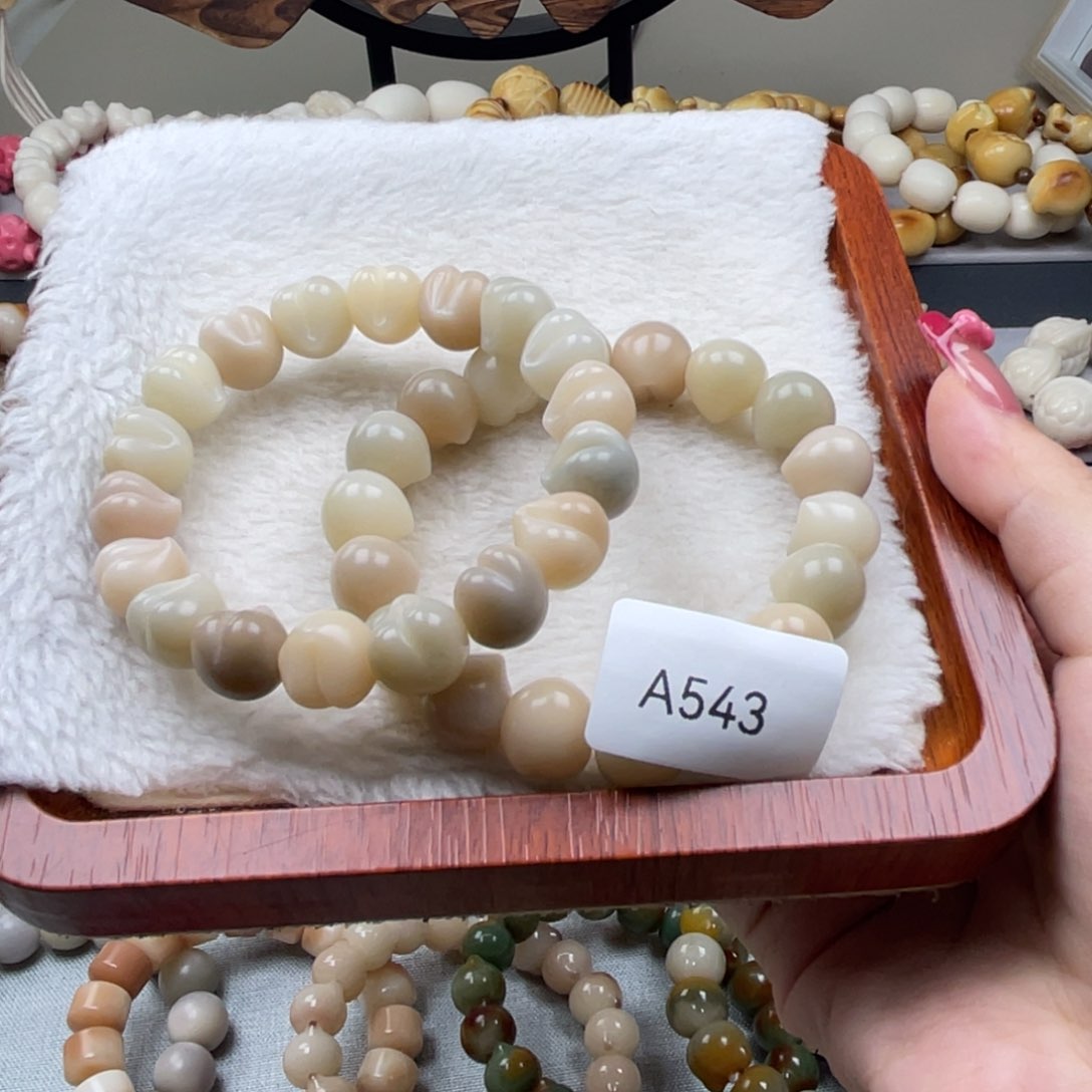 菩提根/象牙果吊坠瑕A543桃子12mm一串随机