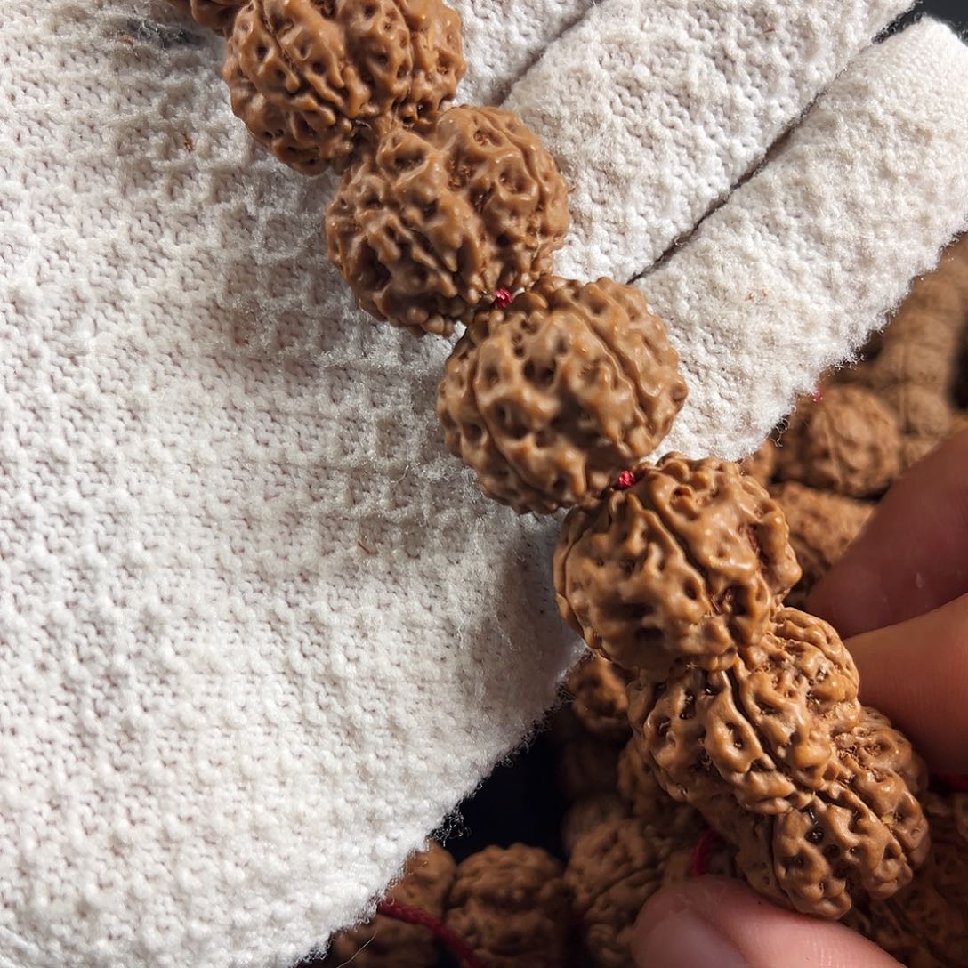 X***i吊坠金刚菩提毒药梅花