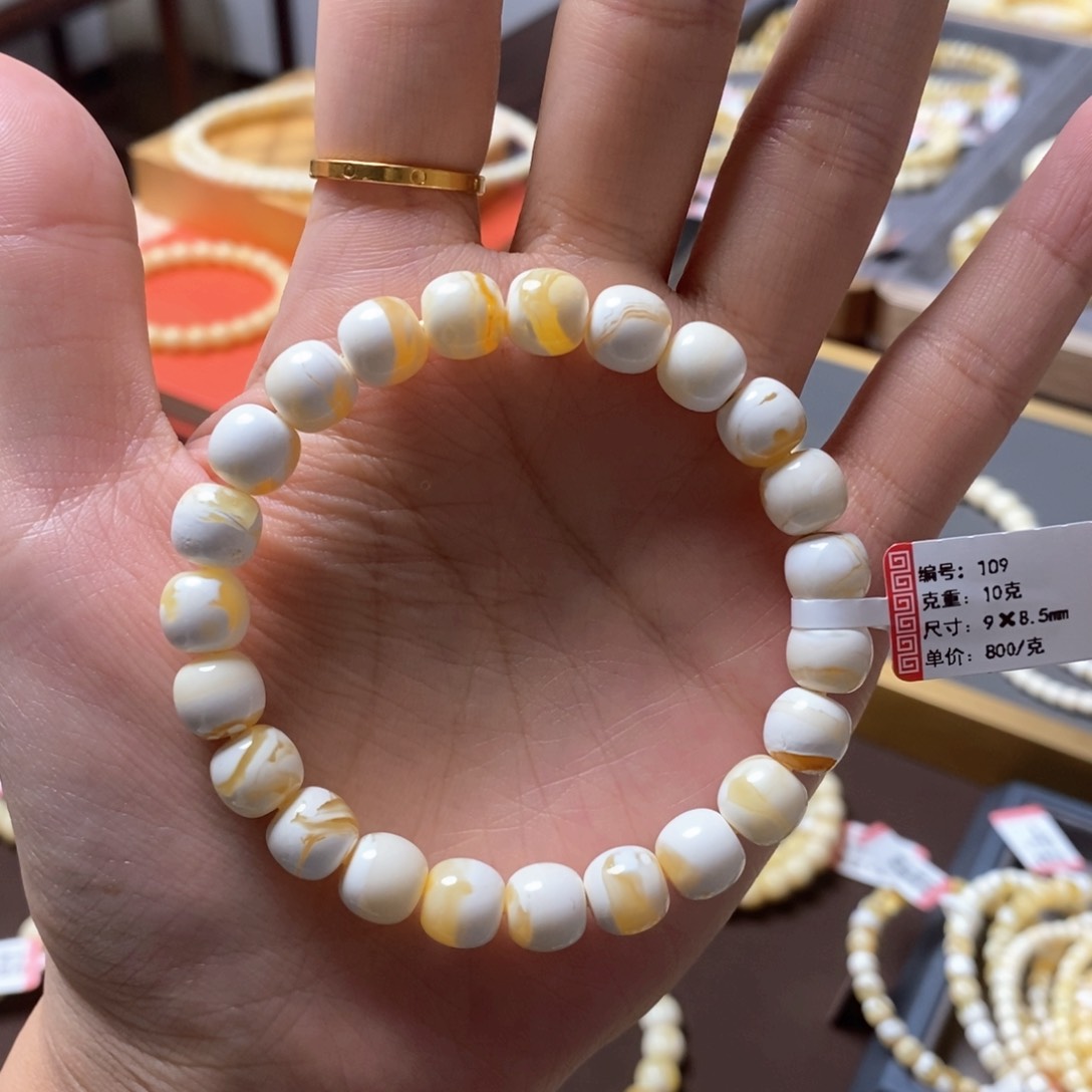 琥珀裸石未镶嵌思***带9*8.5金瓷妖白老型手串