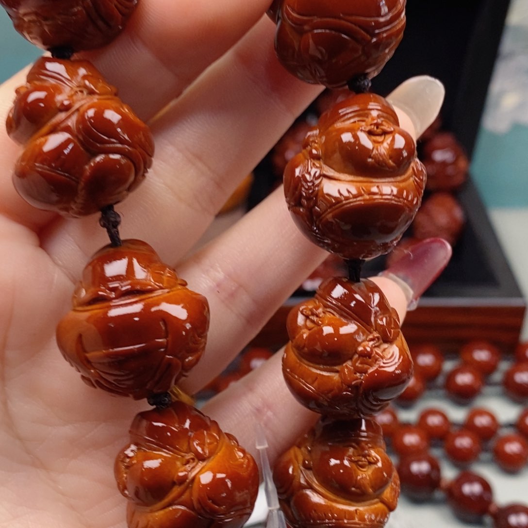 橄榄核吊坠创****家橄榄核