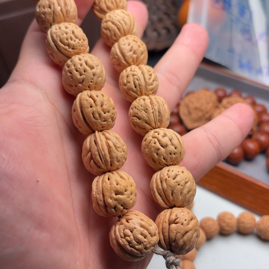 吊坠桃核盘锦爆肉