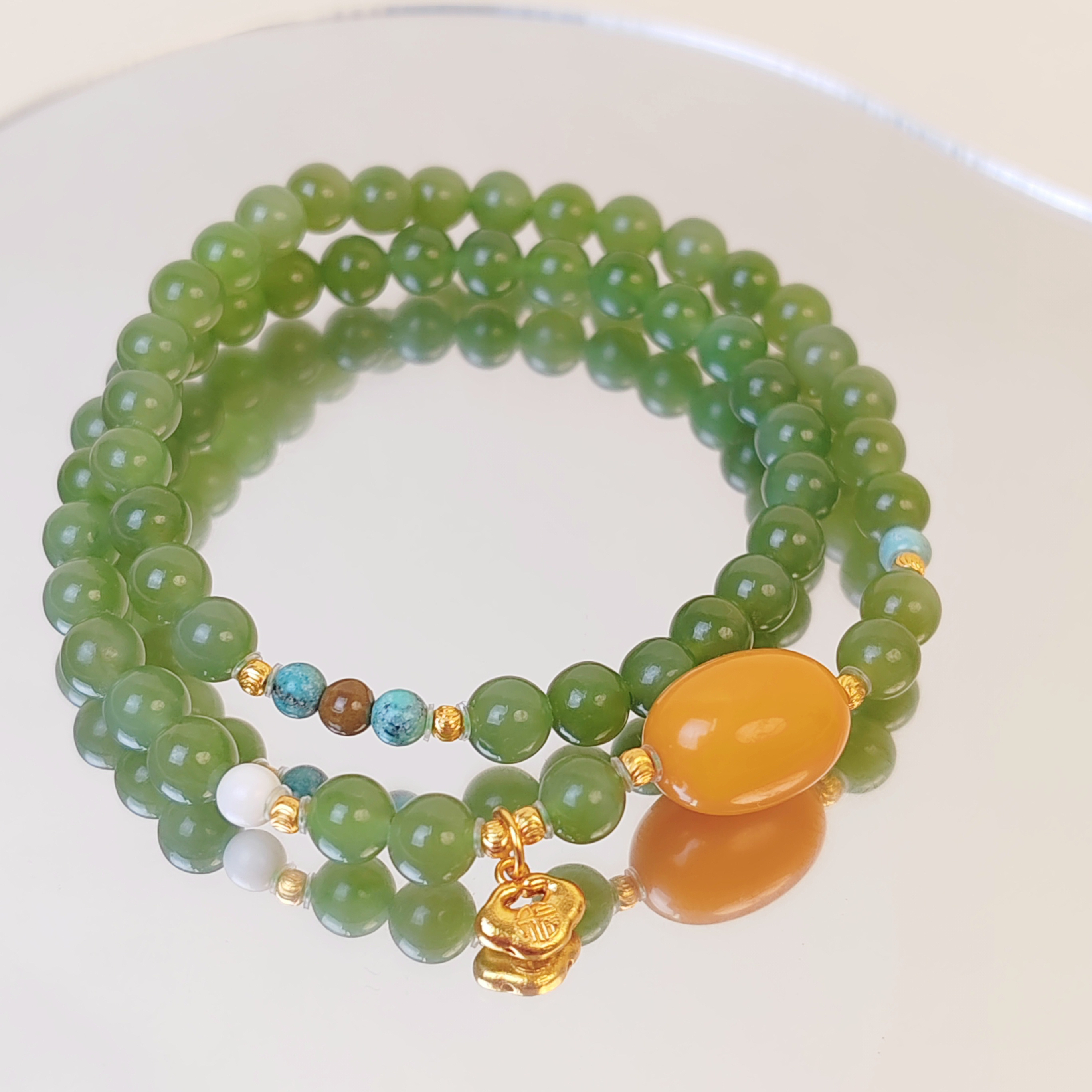 俄碧6mm鸡油红枣珠双圈手串