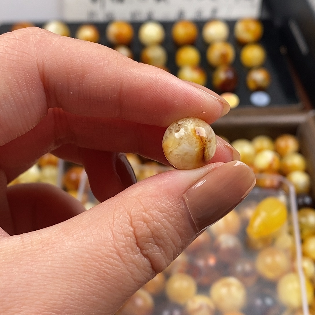 鸣***琥珀未镶嵌裸石蜜蜡