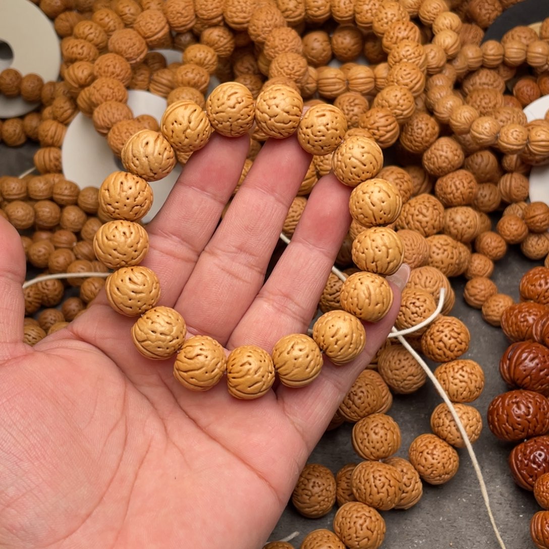 曹***手串桃核桃核金丹闪40