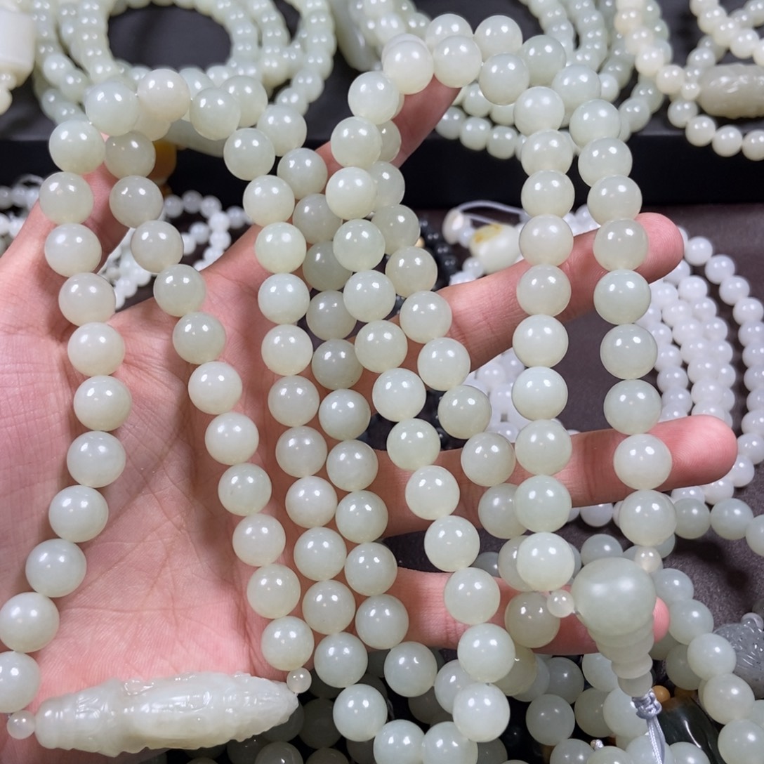 ****儿和田玉未镶嵌把件