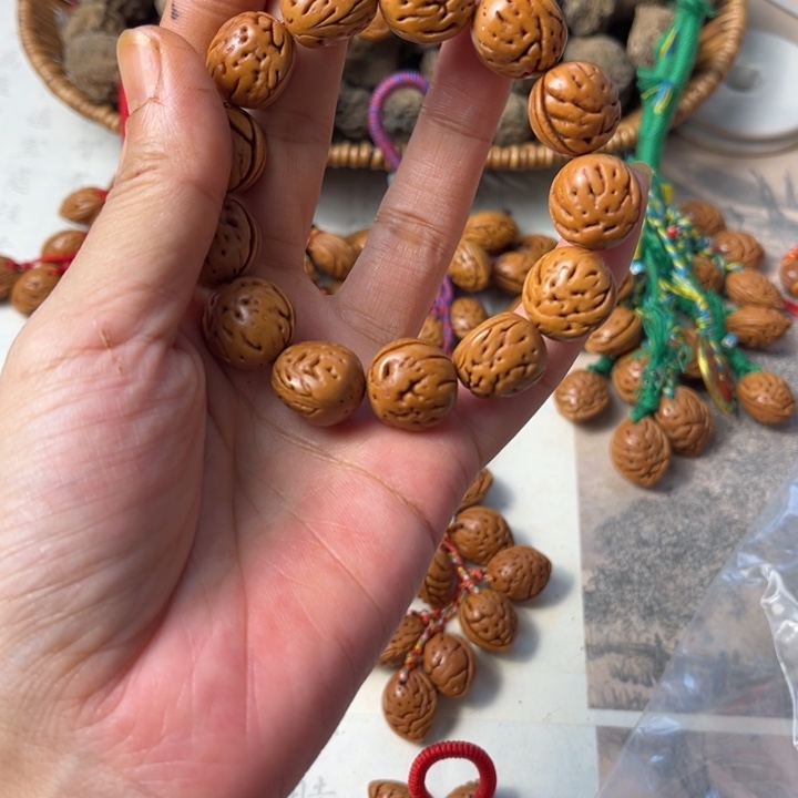 珊***瑚桃枭手串到手15颗，