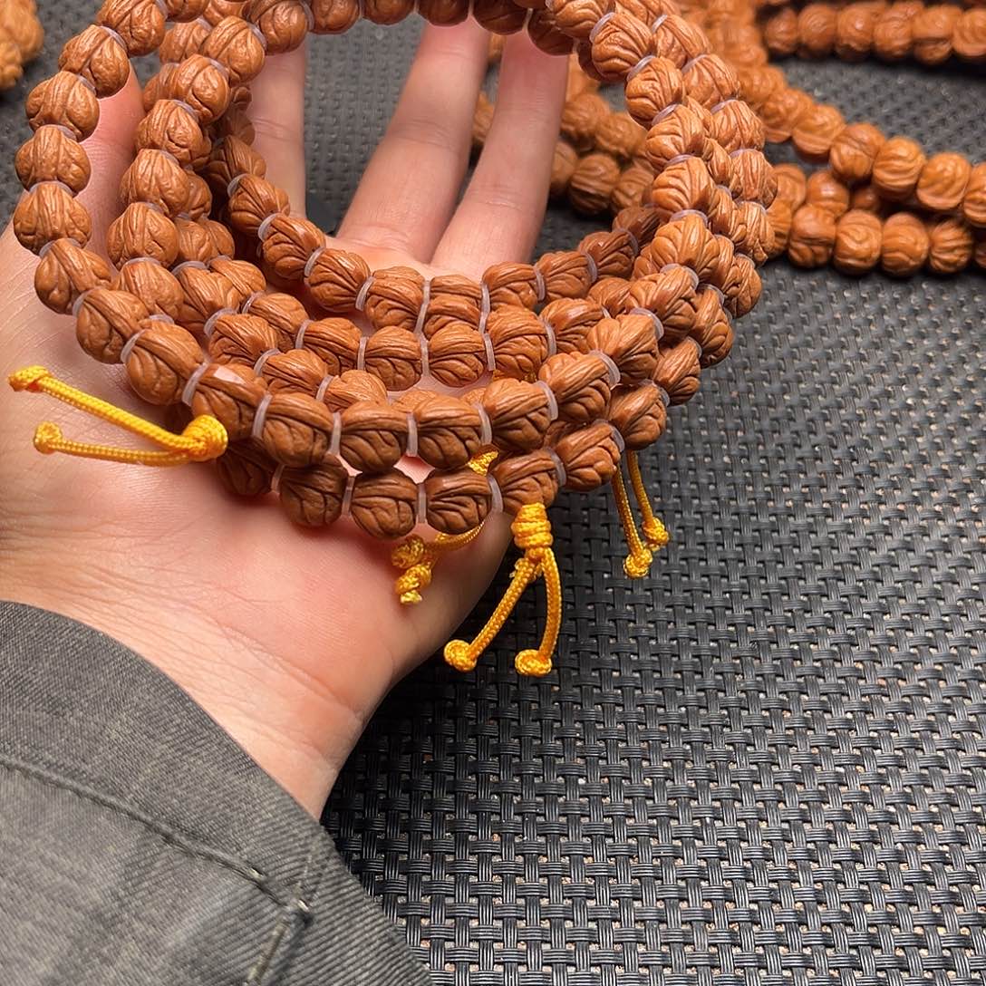 桃核吊坠找龙纹手持