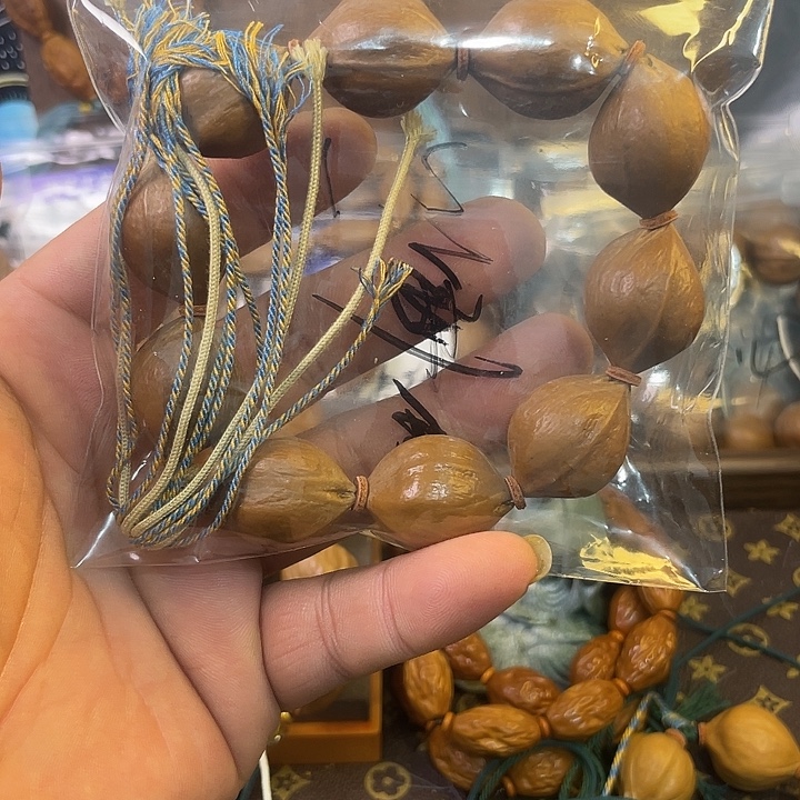 彼***得手串橄榄核德庆果王2.1