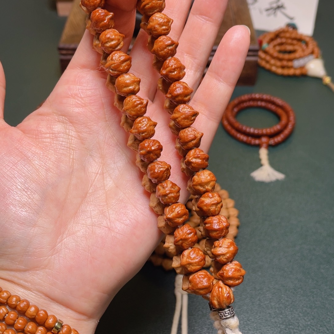 吊坠柏香籽/百香籽白牙横打手持