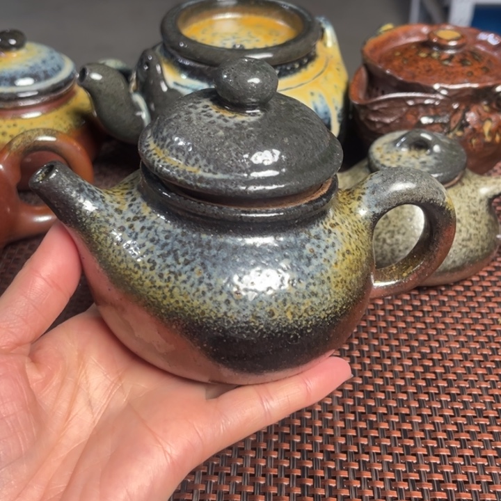 紫砂茶杯中容天壶