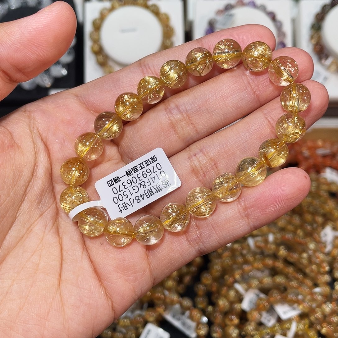 鲤****发晶未镶嵌手链毕业猫眼钛晶9.4mm