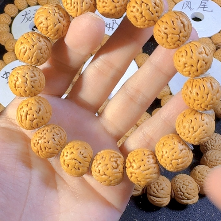 建***队吊坠桃核18盘锦奶豆桃核