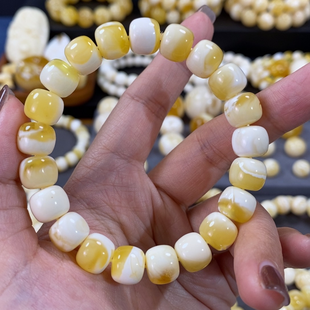 蜜蜡手串未镶嵌10.7mm金瓷白妖花溶洞手串