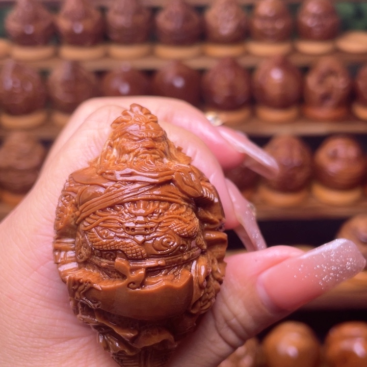 橄榄核把件天***输橄榄雕刻
