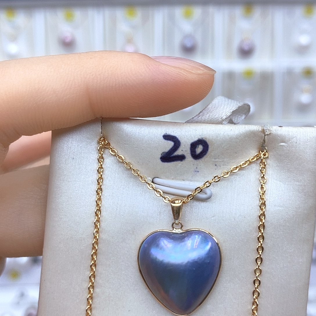 淡水珍珠18K金镶嵌颈饰辣****糕