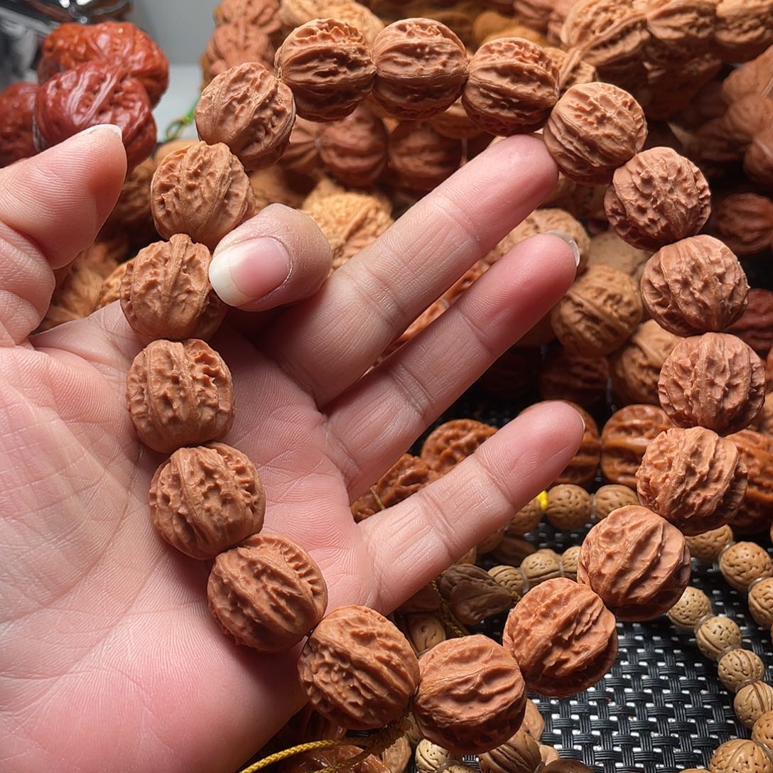 一***花文玩核桃手串京八棱