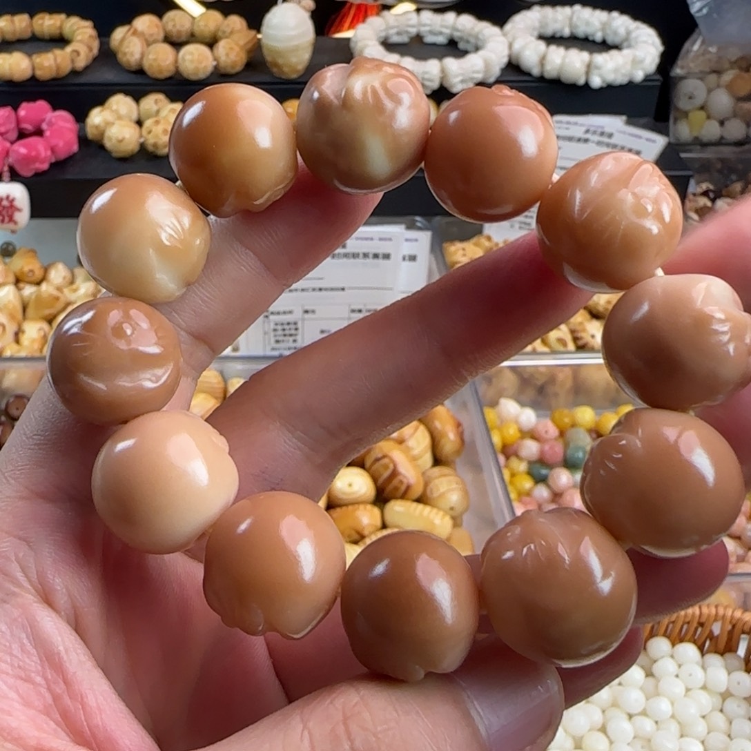 吊坠菩提根/象牙果微瑕疵粉色机器猫手串一条