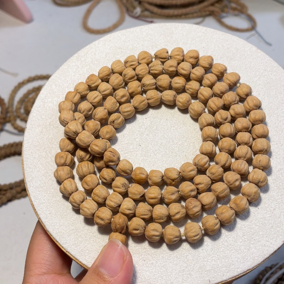 屮***茻柏香籽/百香籽吊坠