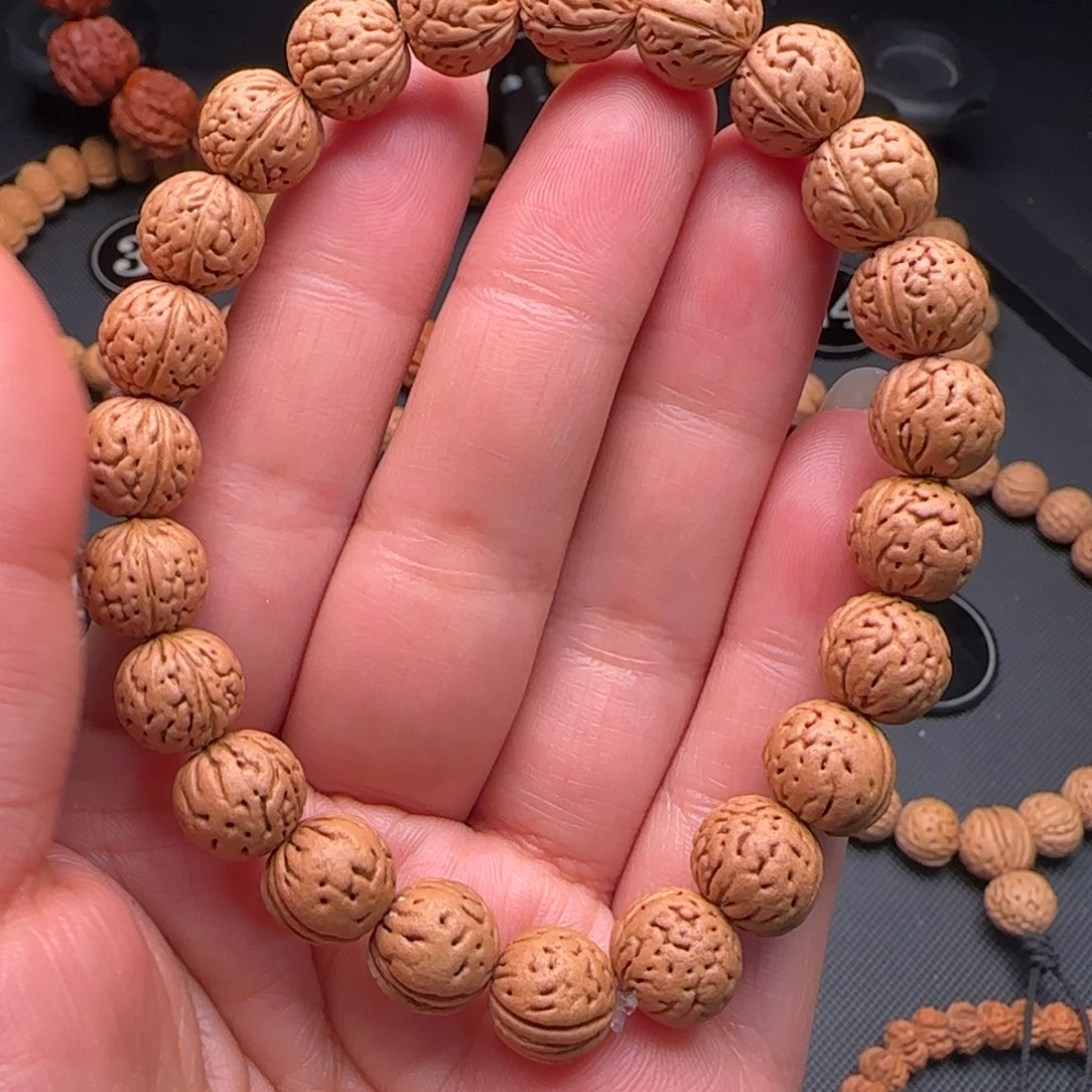 桃核手串盘锦奶豆