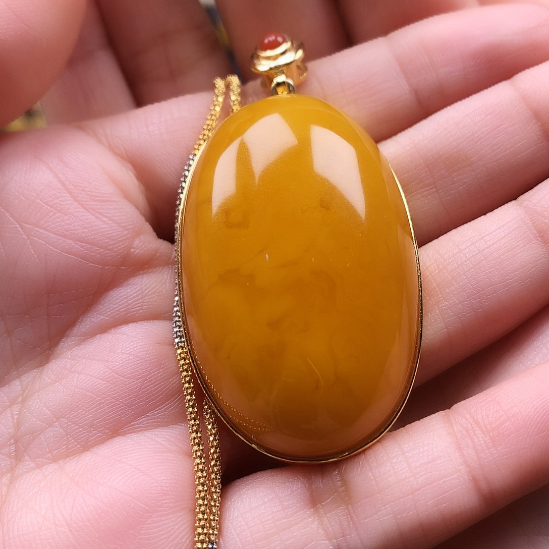 蜜蜡颈饰银S925镶嵌。****人吊坠