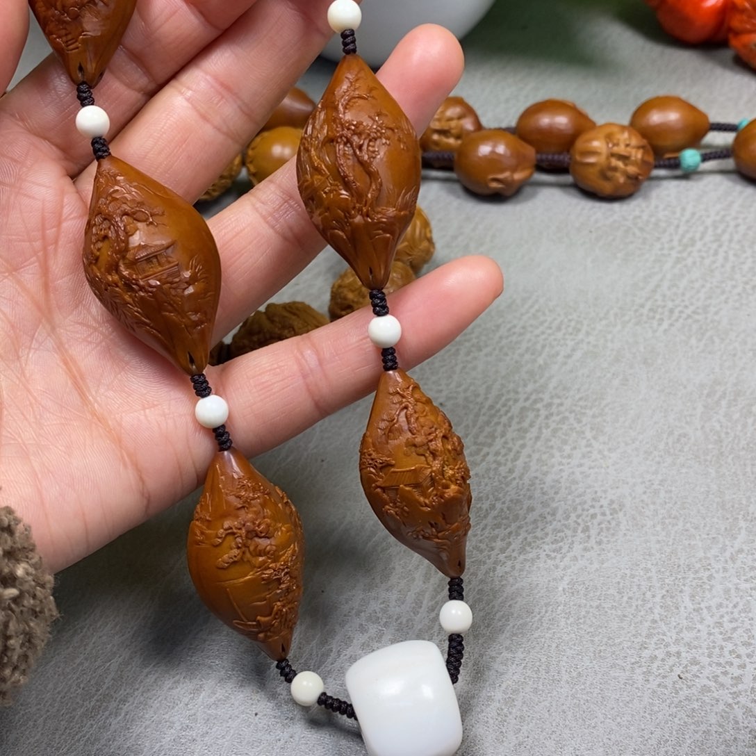 橄榄核吊坠桃花源记