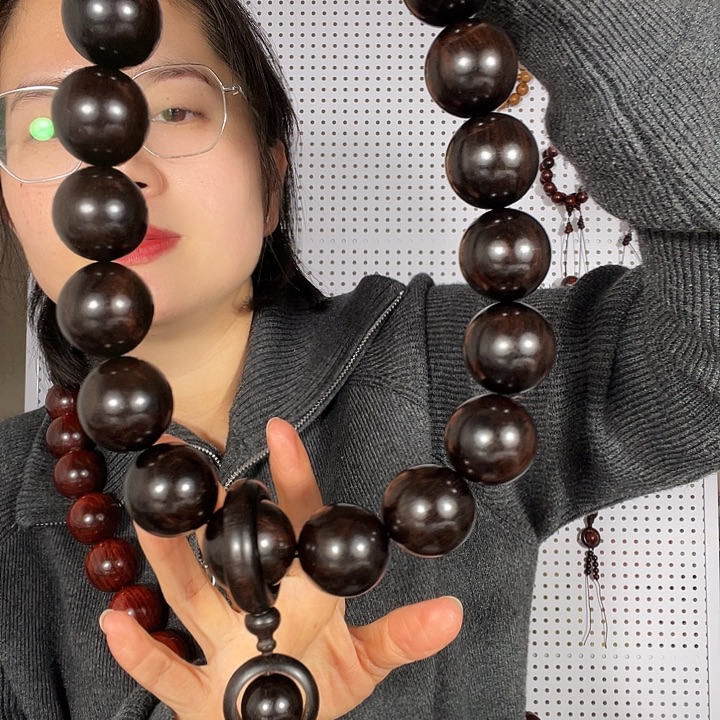 曾***你木质类紫光檀3.0*19颗手持