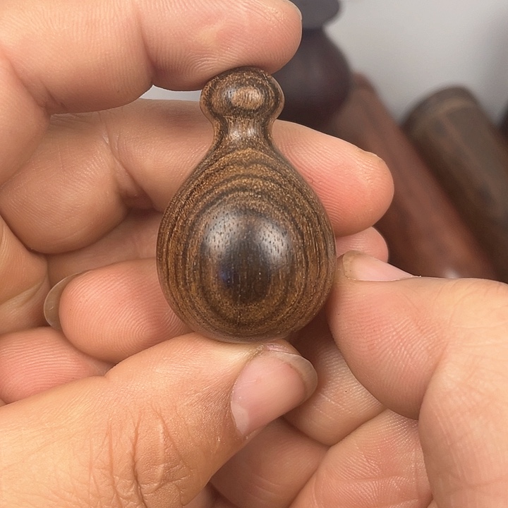 破布木（黄金檀）手把件