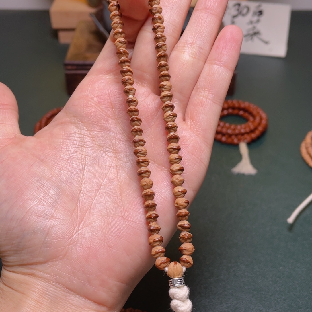 吊坠柏香籽/百香籽小凤眼手持