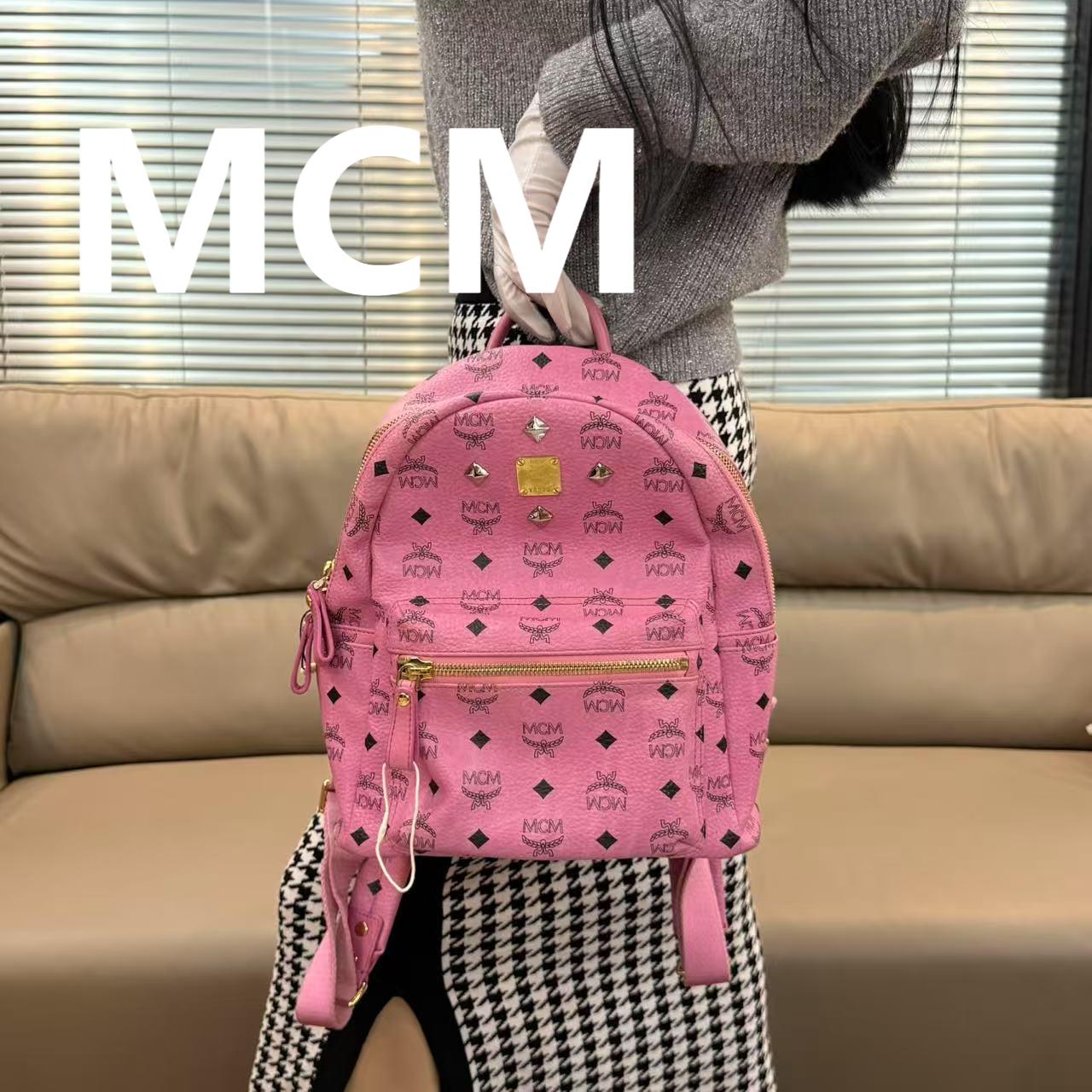 95新 MCM 粉色双肩包/54541