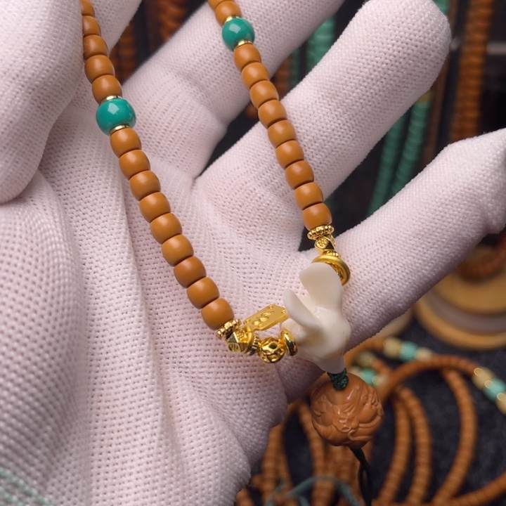 橄榄核吊坠哈哈哈