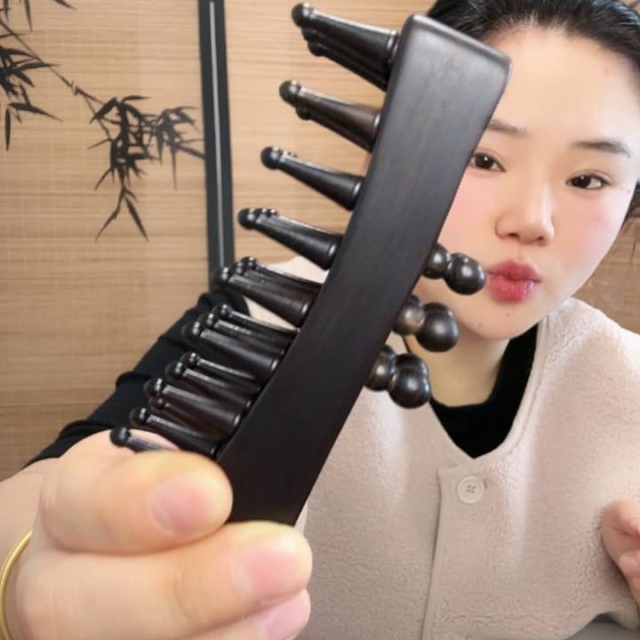 紫光檀方形三排梳子瑕疵