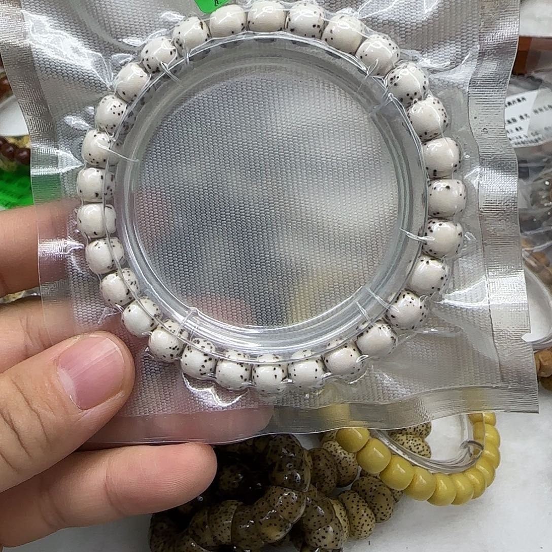 矢***.星月菩提手串98傲世白星月菩提87单圈河豚