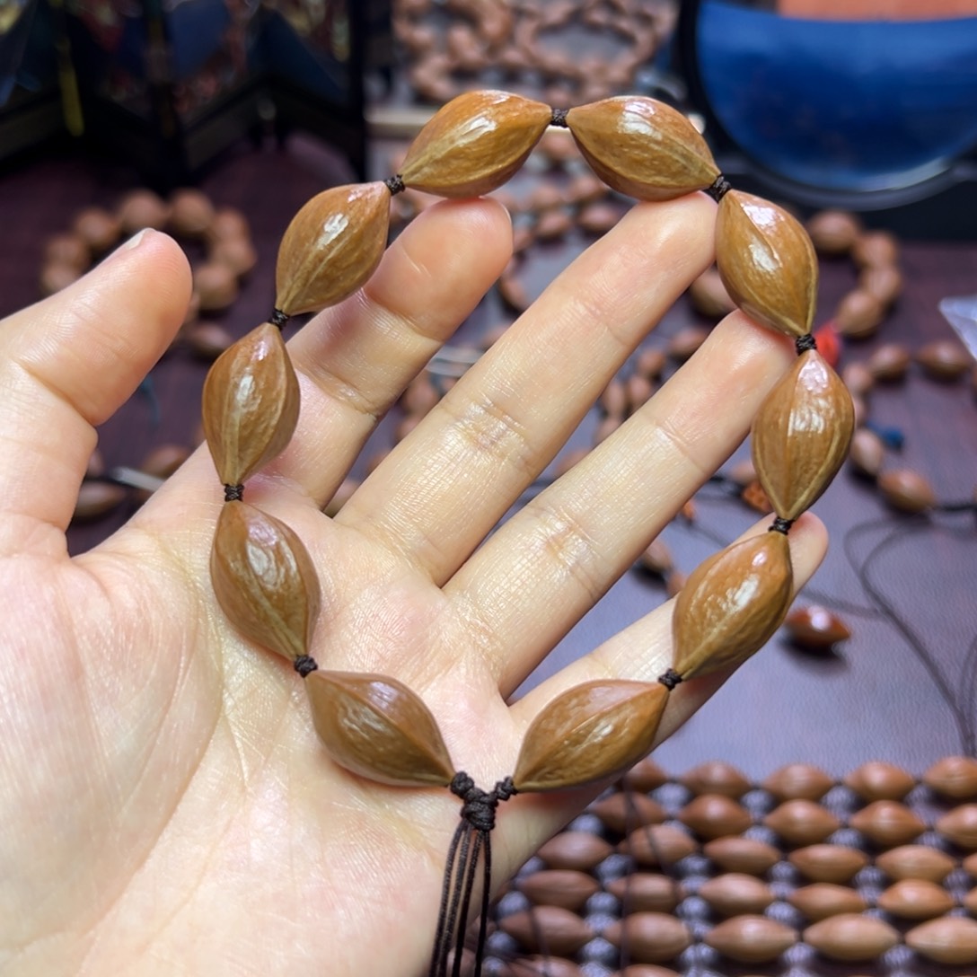 橄榄核手串/手链油 红皮三角核 1.3 2.4左右