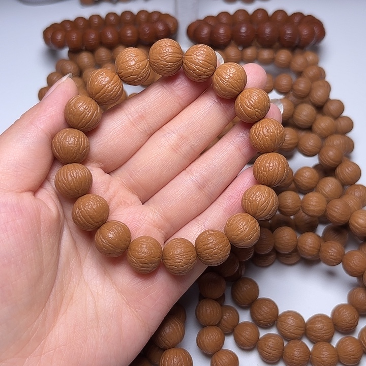 可***樂吊坠猴头核桃14+同尺凤羽手串