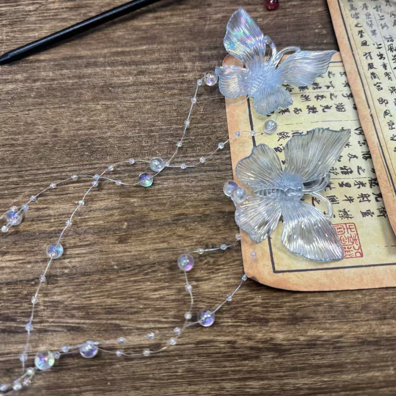 幻彩蓝蝴蝶泡泡珠发夹。前尘梦古风汉服配饰