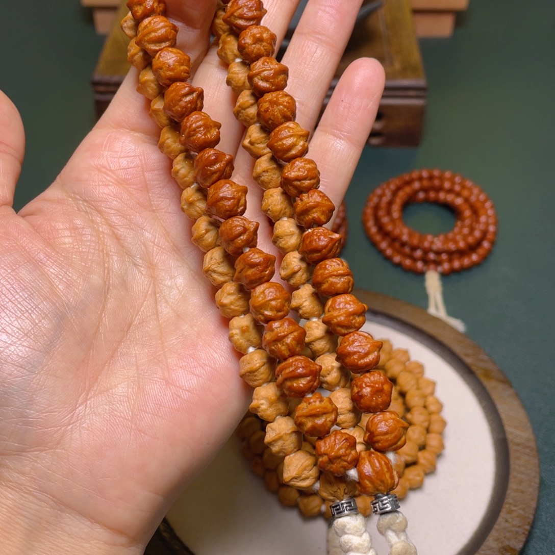 柏香籽/百香籽吊坠白牙横打手持