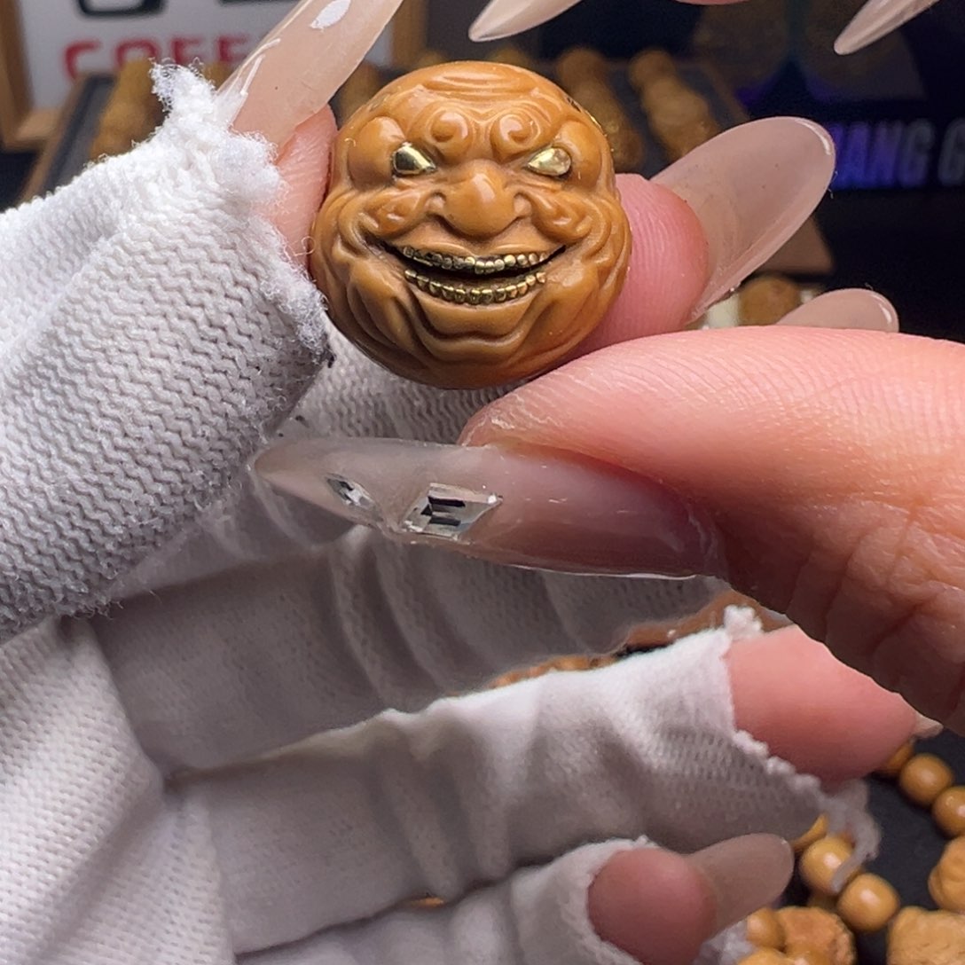 文玩核桃把件镶嵌款金花佛爷18左右尺寸全品有正常封口线