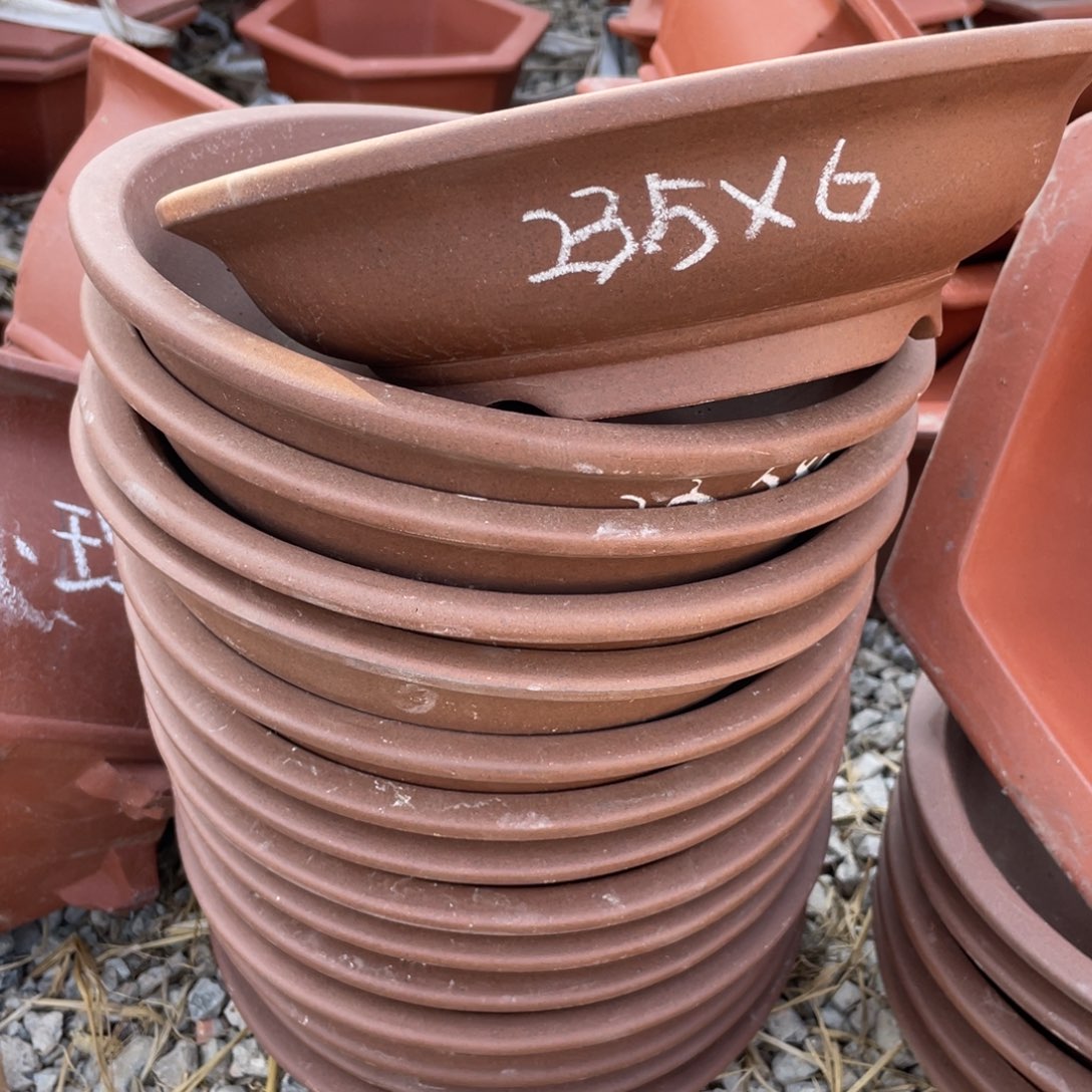 紫砂一组九只 23*6 圆碗