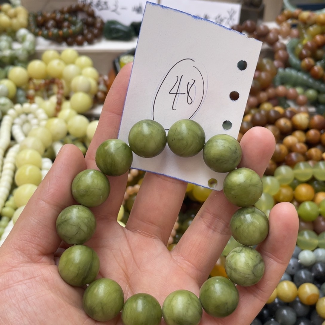 透闪石-蛇纹石玉手链未镶嵌文*君