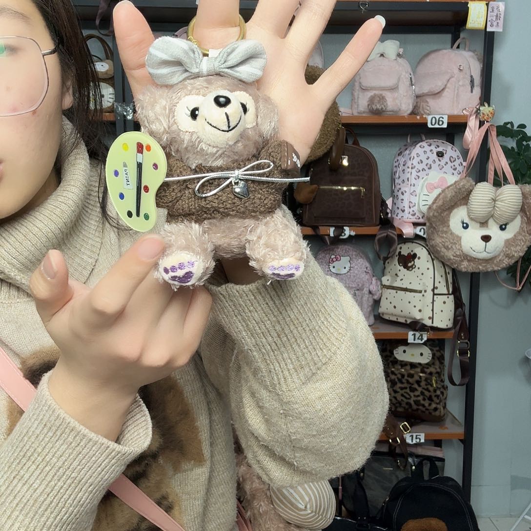 雪莉玫挂件毛衣棕色特价款