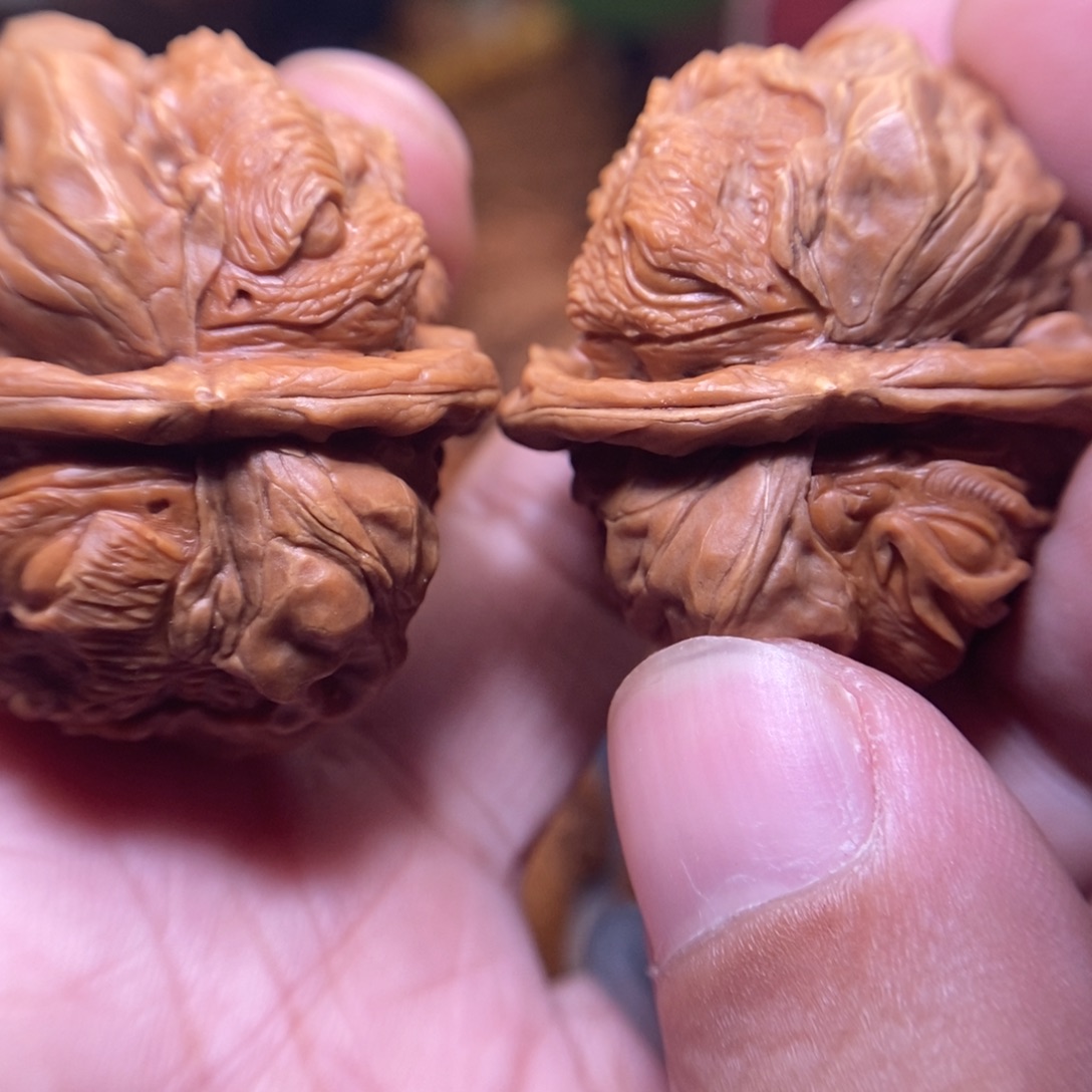 文玩核桃把件纯手工雕刻四面蜕变