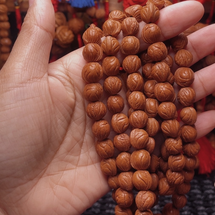 伯***6木质类龙纹桃枭挂件