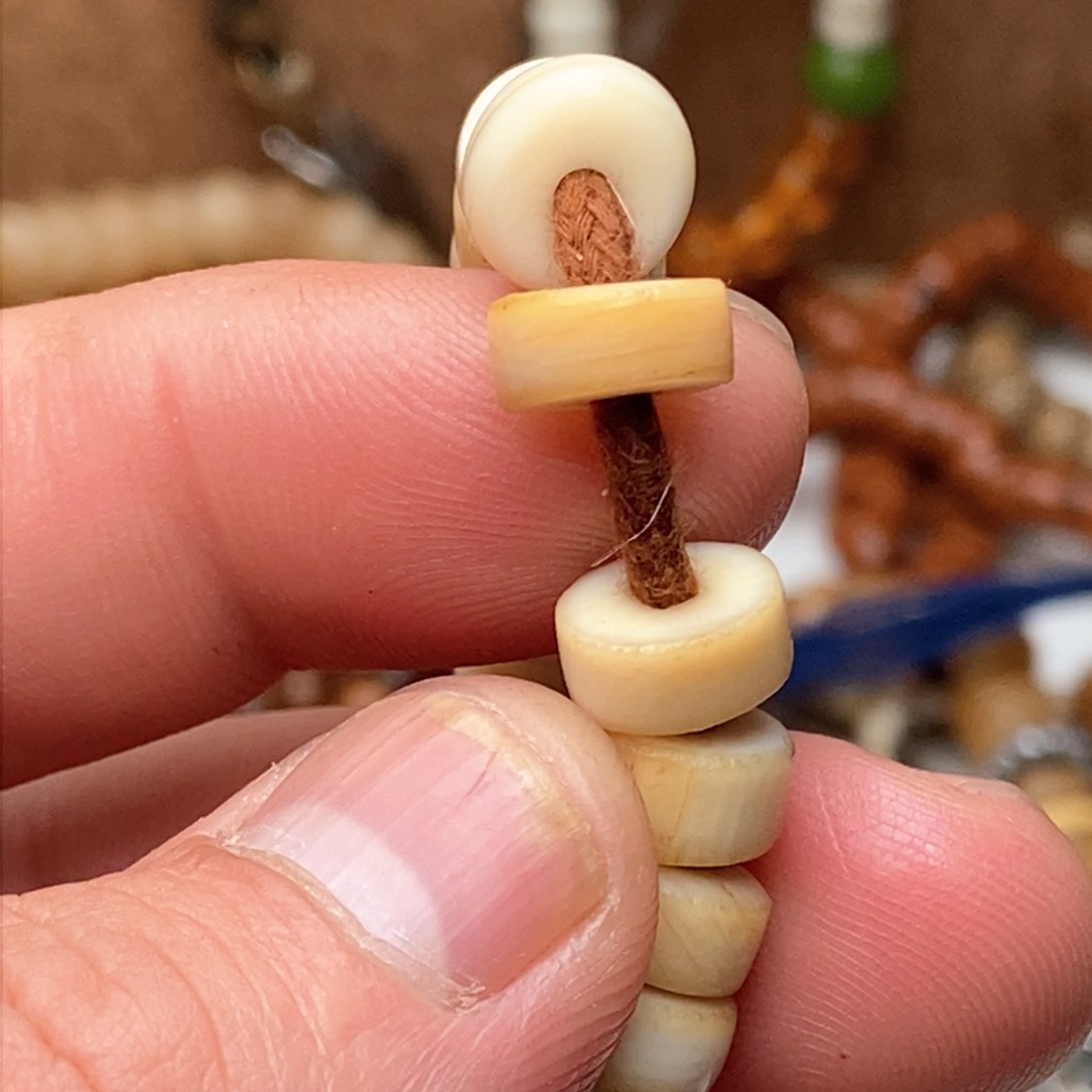 琉璃颈饰芒**物藏传精品小元素的话说