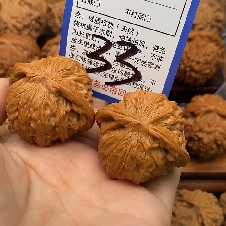 嘉***呀桃核吊坠磨盘狮子头42