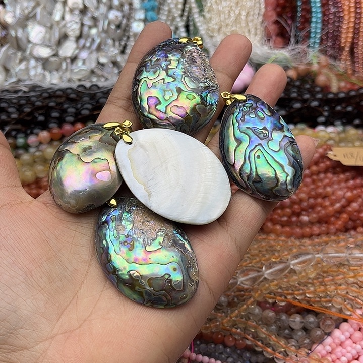 玛瑙/玉髓未镶嵌珠宝半成品一条鲍鱼贝吊坠随机发