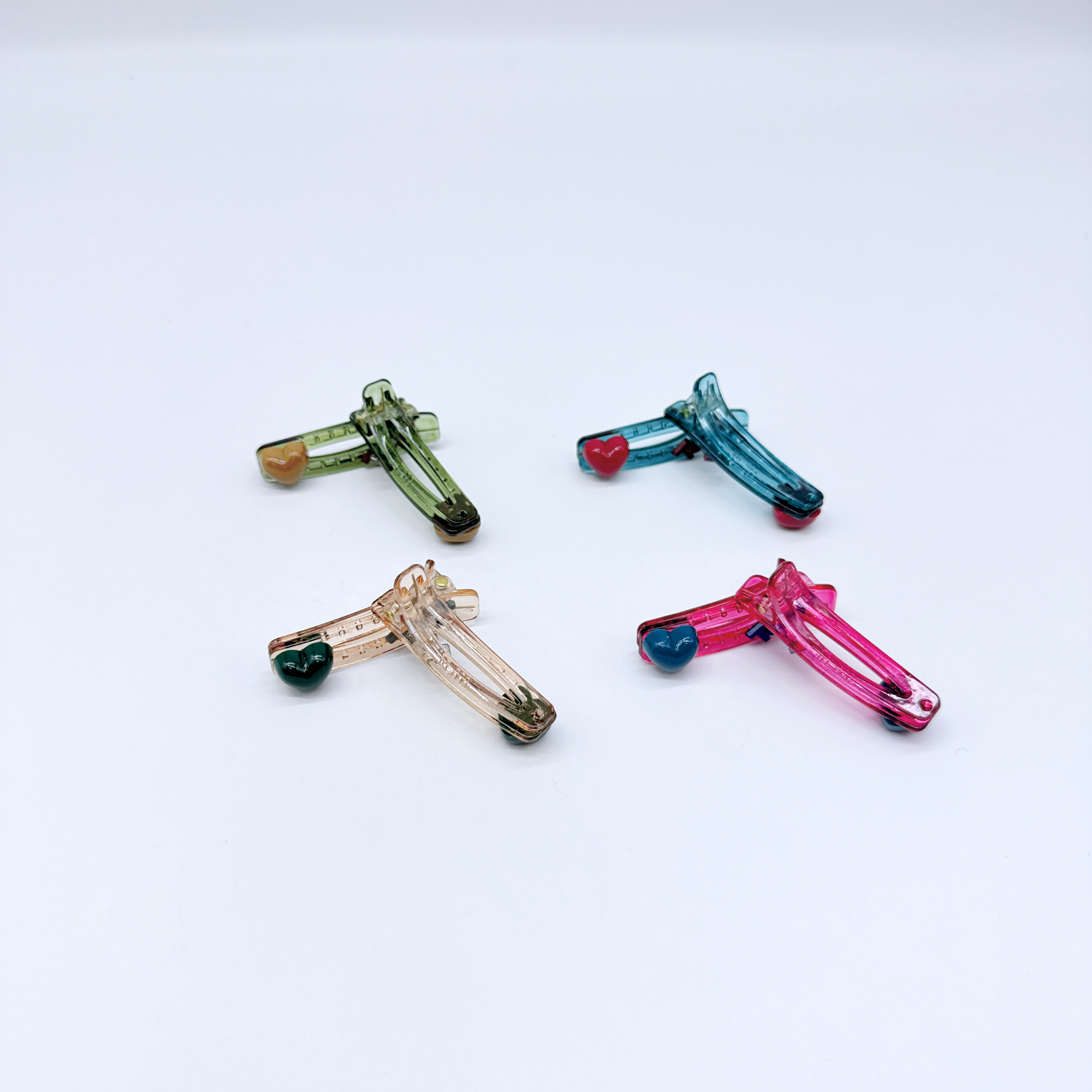 Mi33 透彩爱心小字母标鸭嘴夹 Y15056F3-6