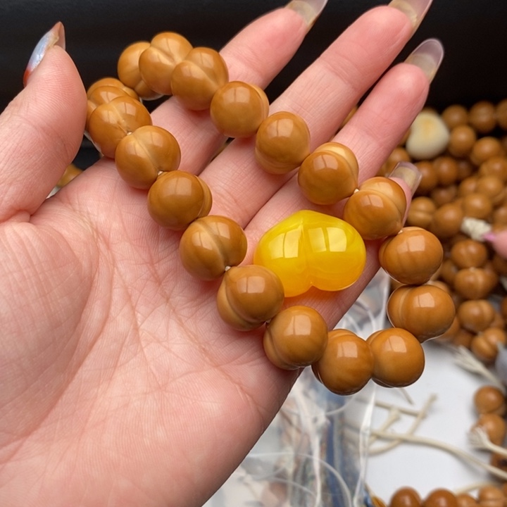 滴***水猴头核桃手串屁桃