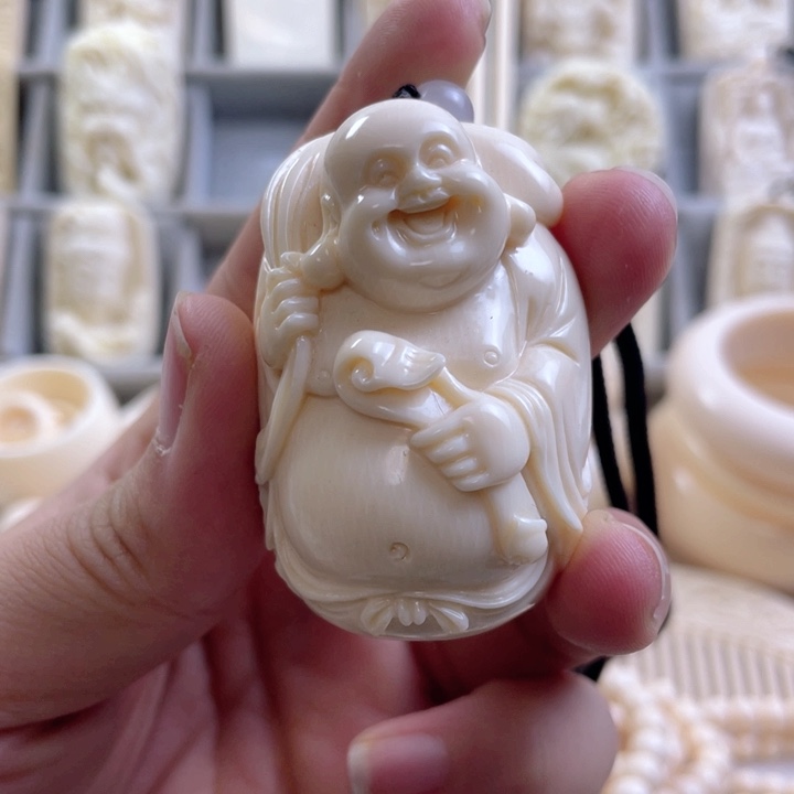 汪***彡弥勒脖挂......一个