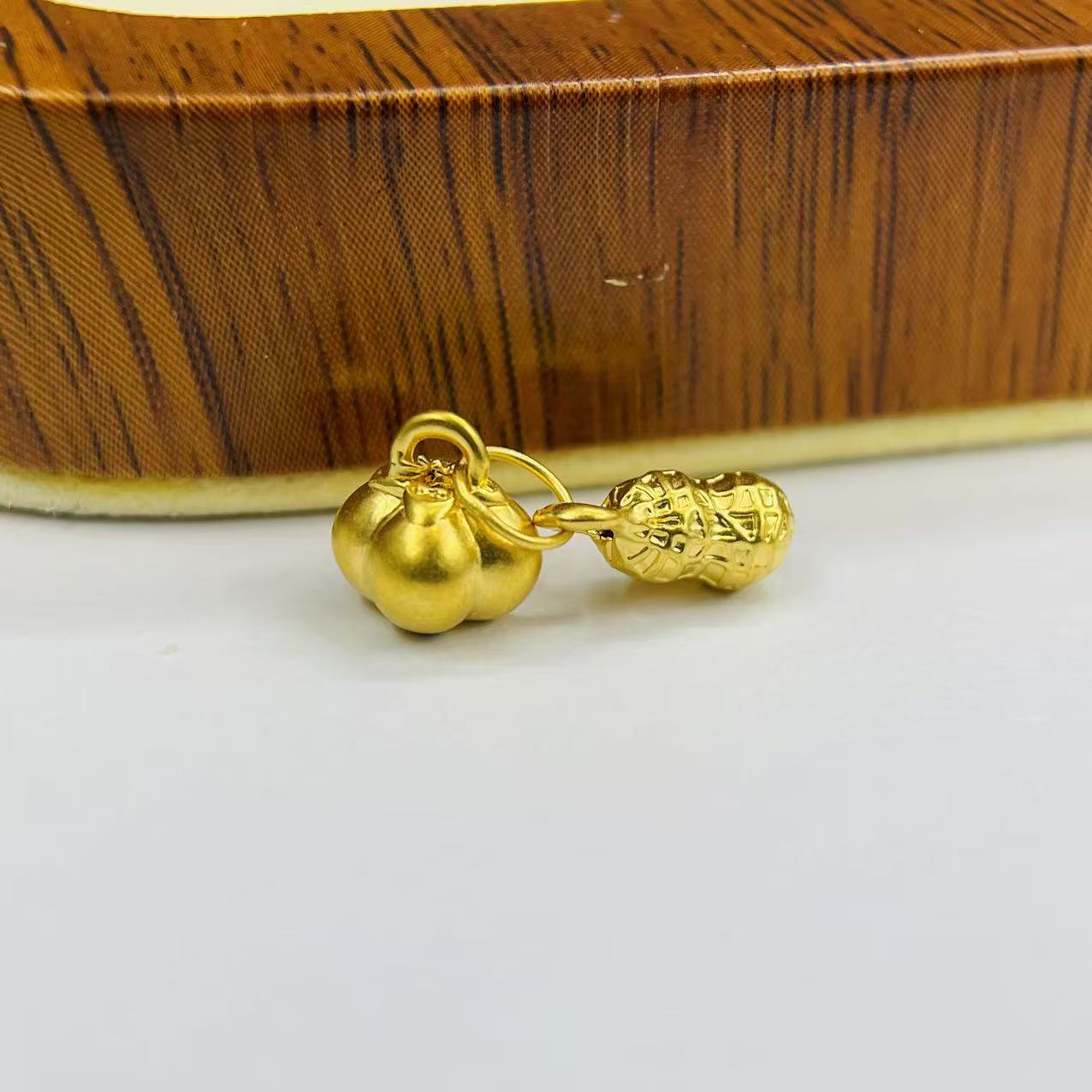 新金社黄金足金999好柿花生DP0299