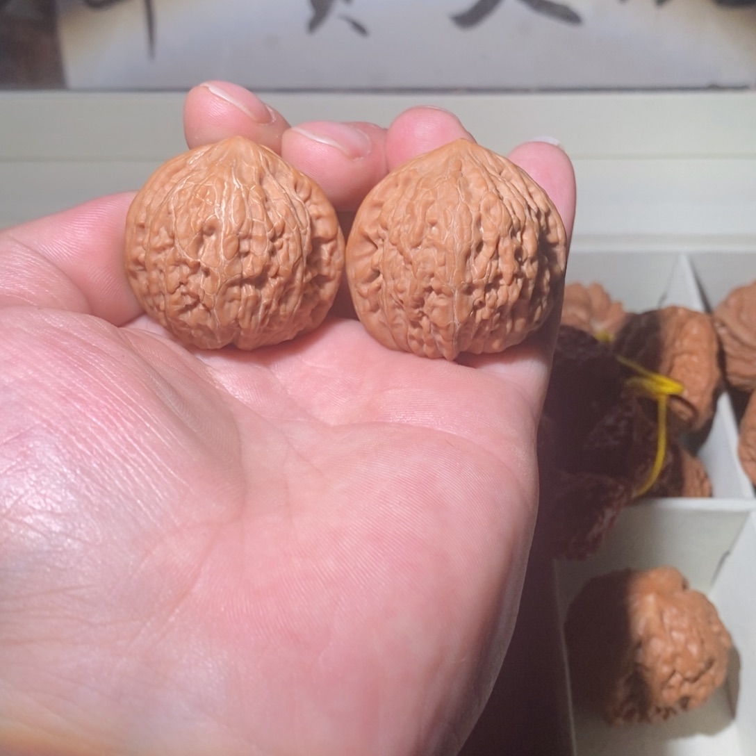 木质类橙*文玩核桃手把件铁锤